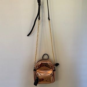 Cross body mini backpack